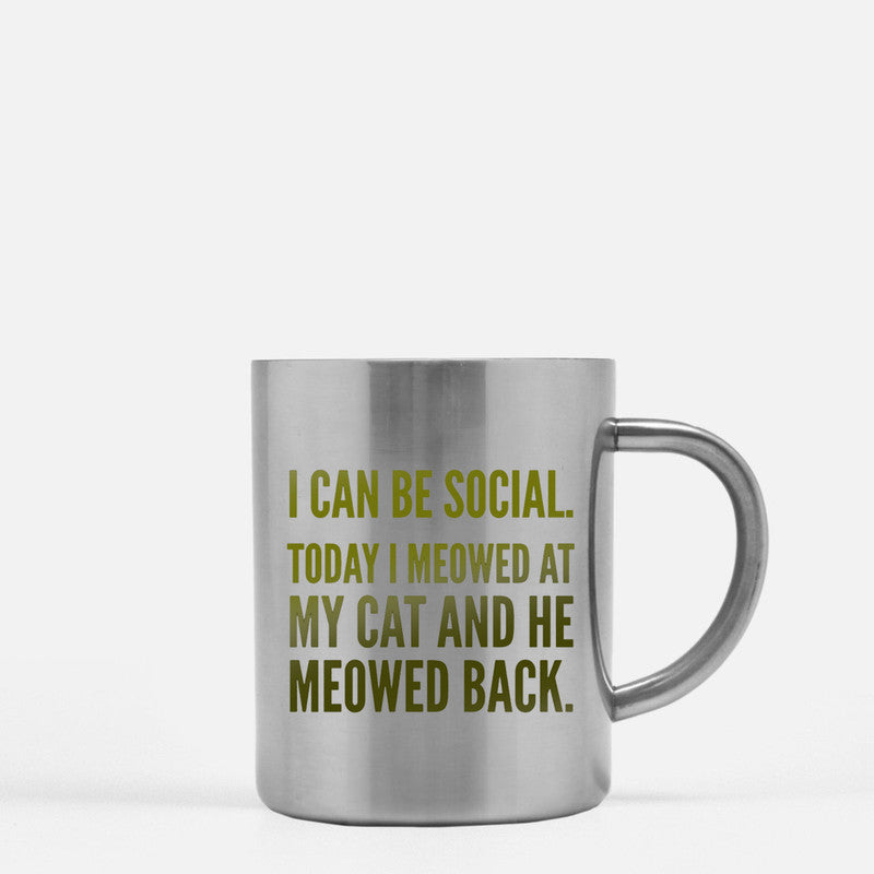 Ceramic mug with gold metallic coating featuring a playful cat design and the phrase 'I Can Be Social Today I Meowed At My Cat'.
